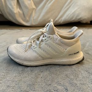 All white Adidas Ultra Boost
